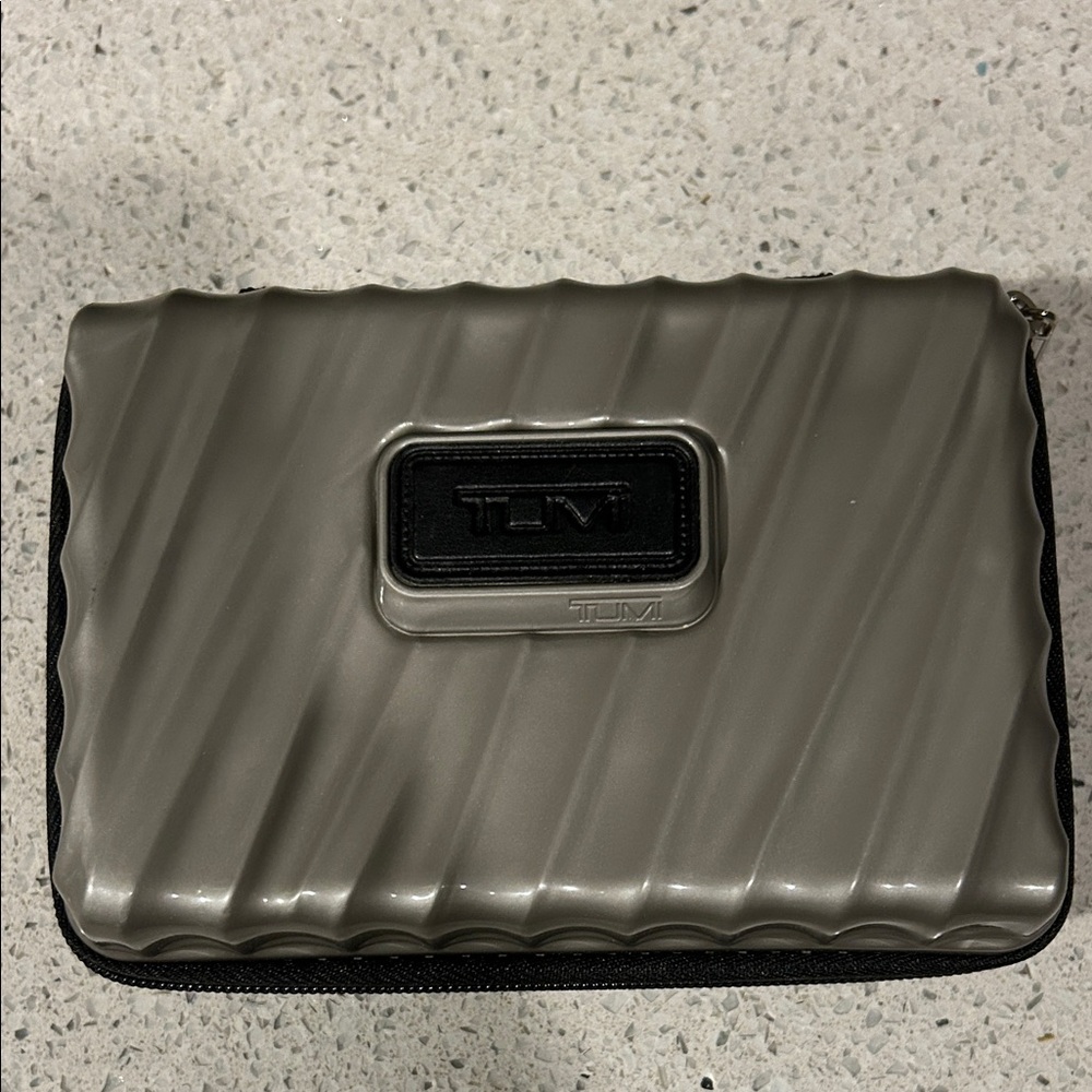 Tumi Delta Metallic Gray Ridged Hard-Shell Travel Case - not used